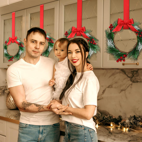 Crowye wreath held by hand showing compact size and cabinet-friendly fit