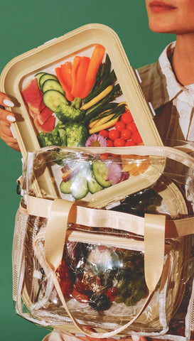 Crudités tray filled with charcuterie and fruit showing versatile entertaining use