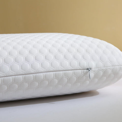 CSDLF pillow on bed with back sleeper demonstrating supportive alignment