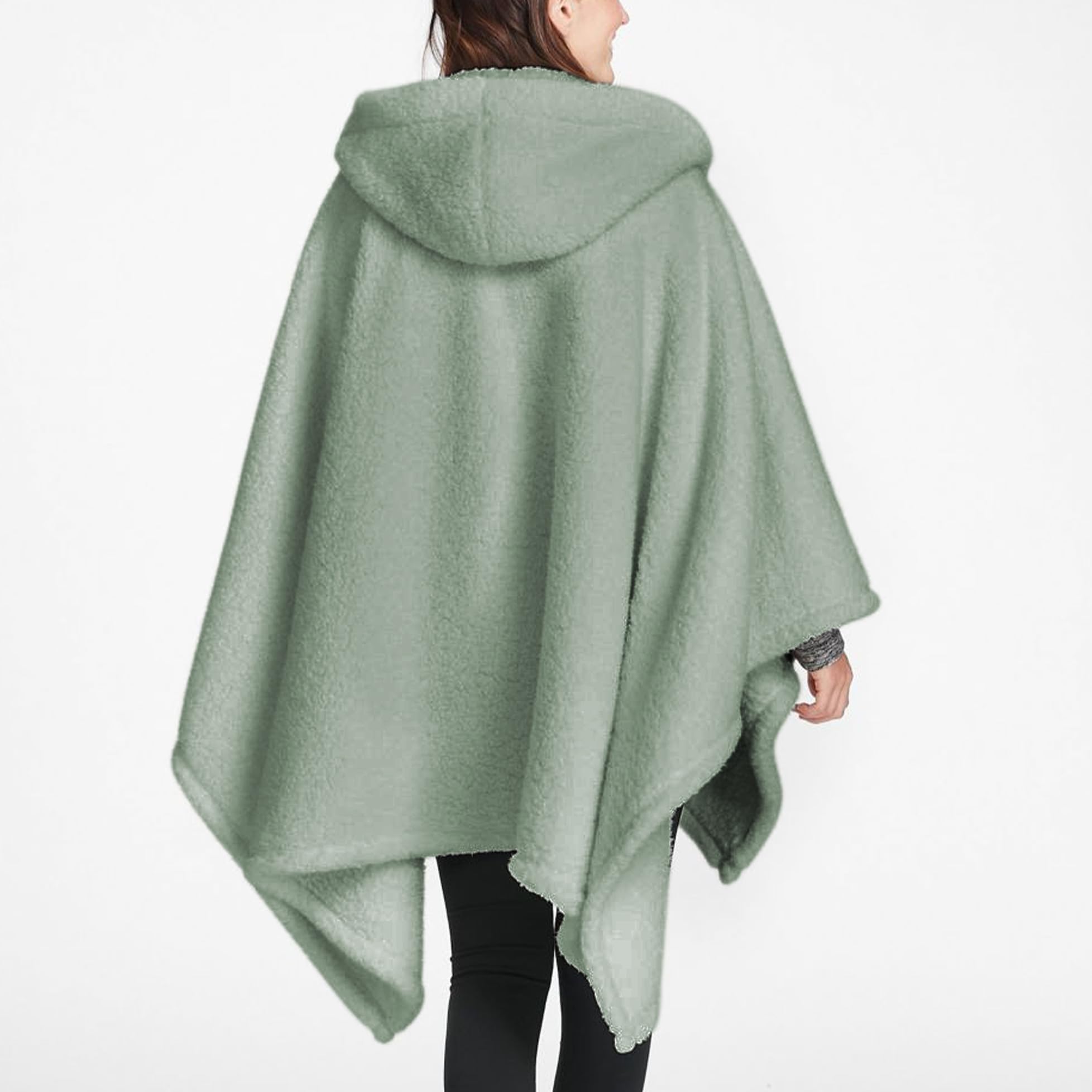 CUBRIDGE model wearing poncho lifestyle showing relaxed, versatile styling