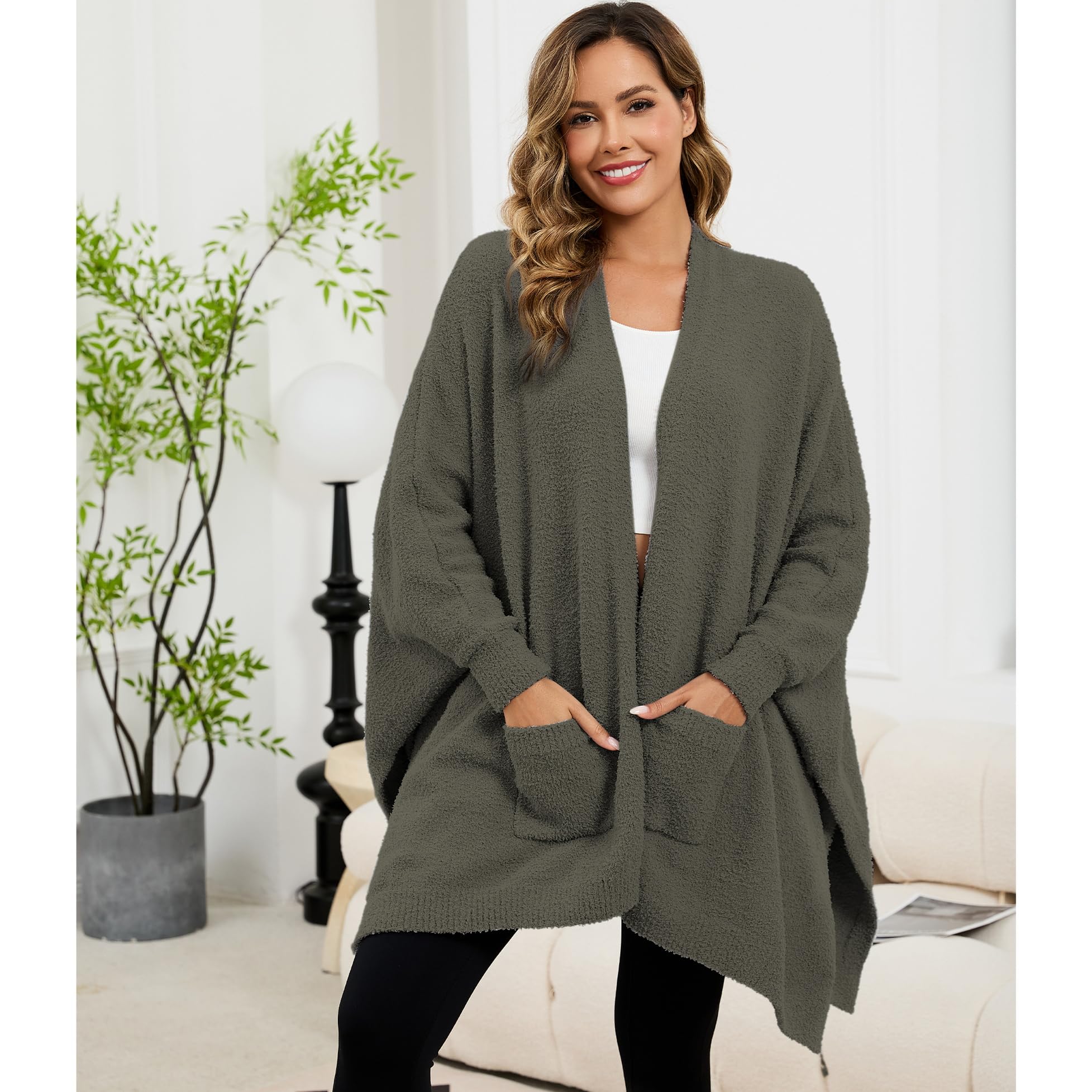 CUBRIDGE side slits and flowy hem allowing comfortable arm movement
