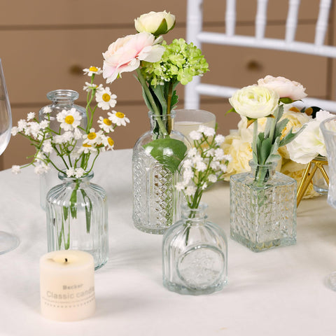 CUCUMI vases on a windowsill catching light, adding brightness and charm