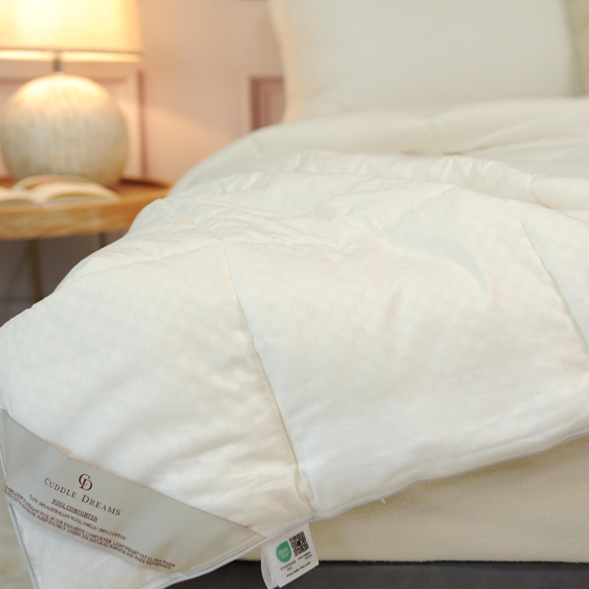 CUDDLE DREAMS front view of queen comforter showing neat piped edges and elegant finish