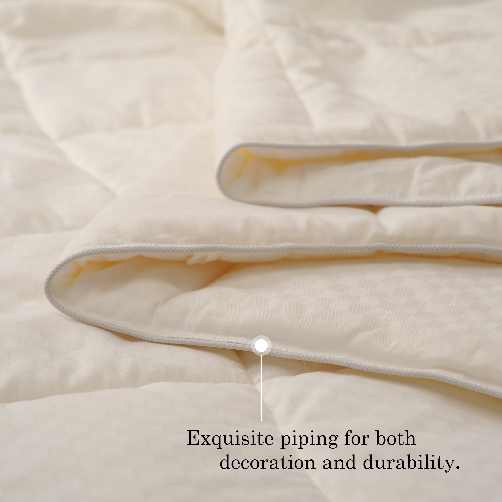 CUDDLE DREAMS comforter styled on a bedroom bed showing breathable midweight comfort and calm decor