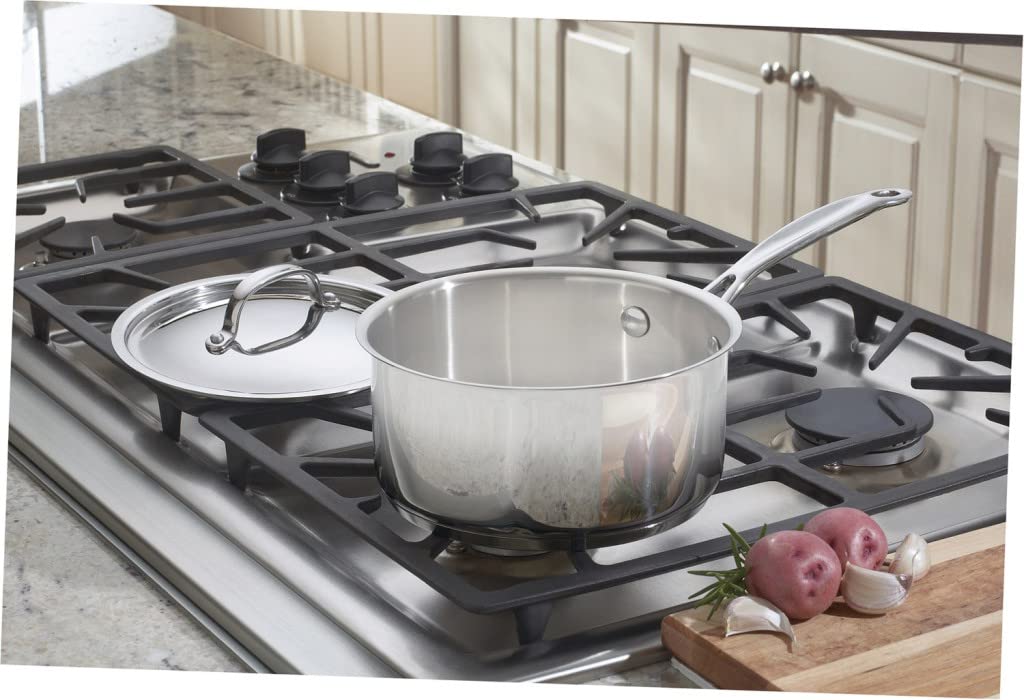 Cuisinart saucepan on stove with simmering sauce, even heating and controlled pouring benefit