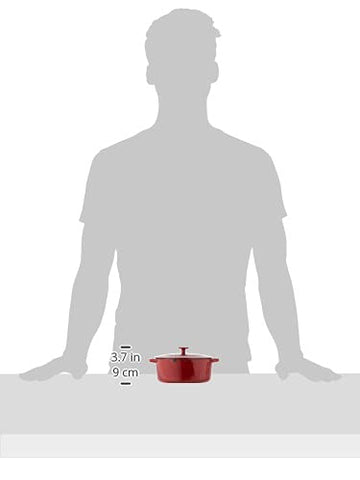 Cuisinart Dutch oven beside a cutting board for size comparison and family portions
