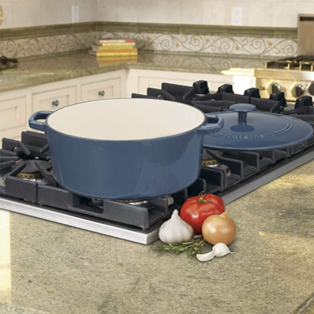 Cuisinart Dutch oven beside vegetables showing 7-quart capacity and family-serving benefit