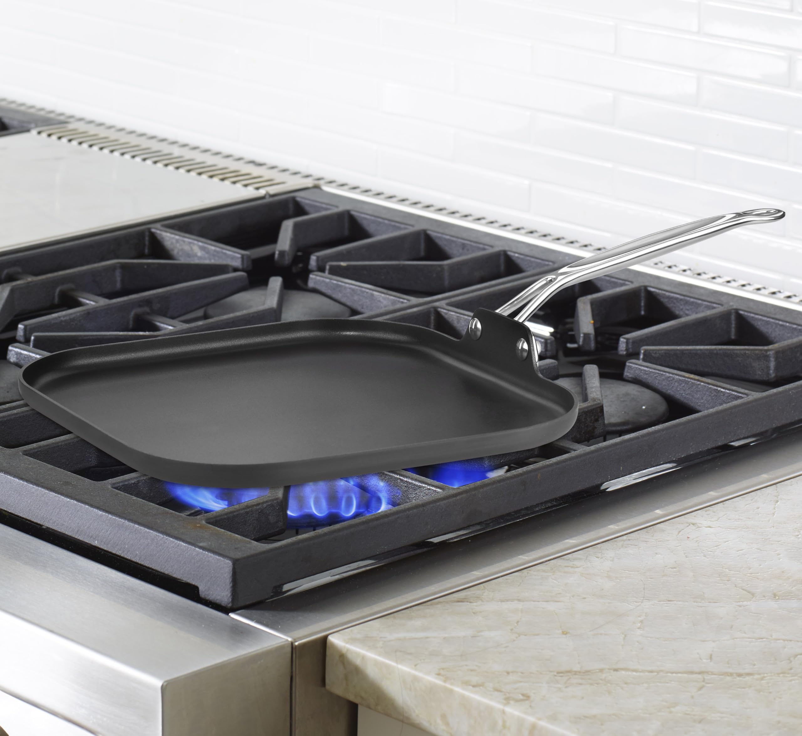 Cuisinart griddle in use with pancakes and eggs, showcasing even heating and easy flipping