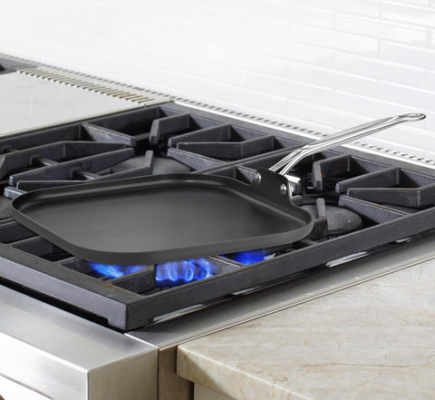 Cuisinart griddle in use with pancakes and eggs, showcasing even heating and easy flipping