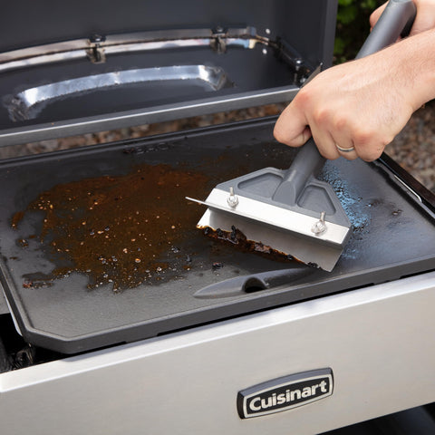 Cuisinart scraper beside kitchen utensils to show compact size and practical scale