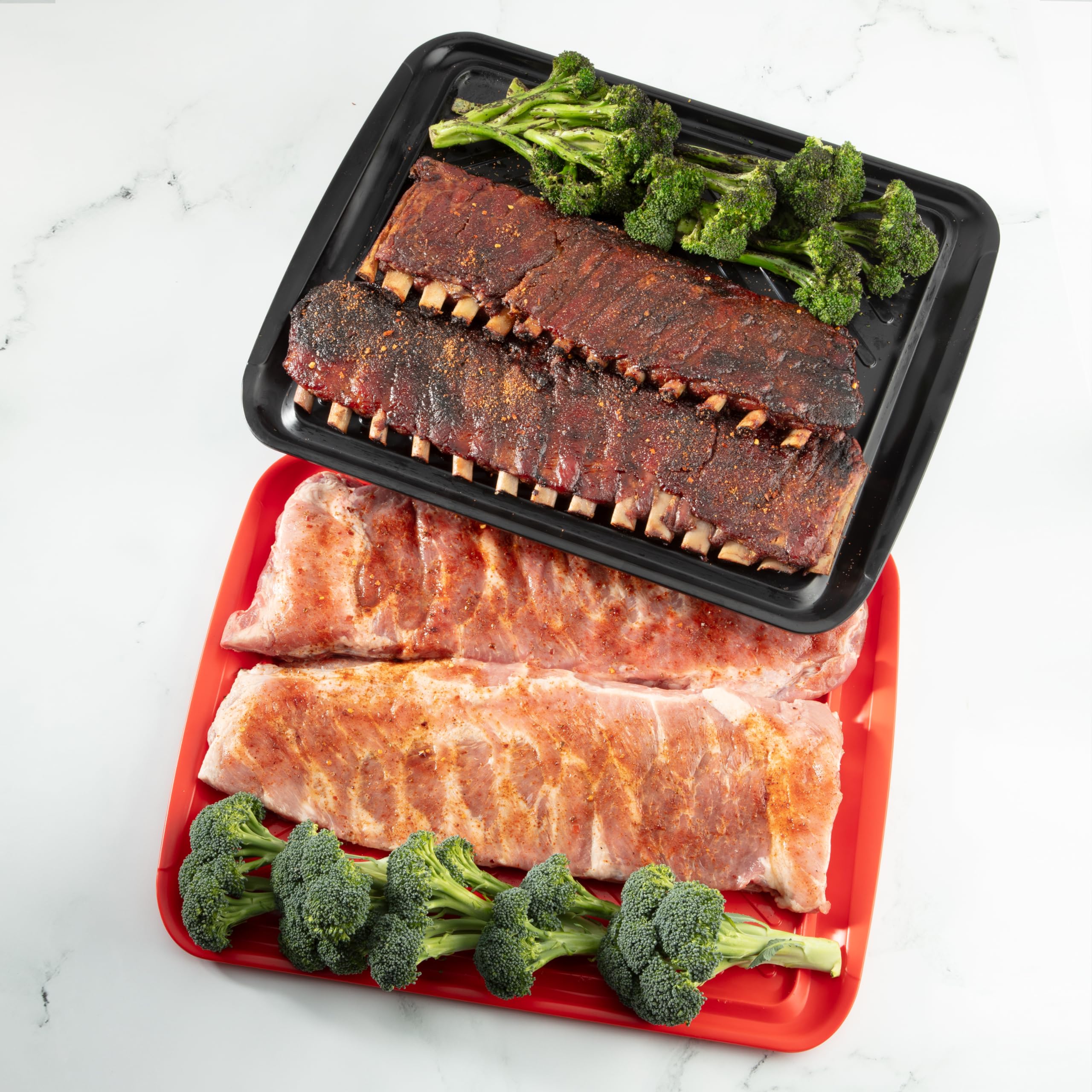 Cuisinart black tray holding grilled steak ready to transfer to table