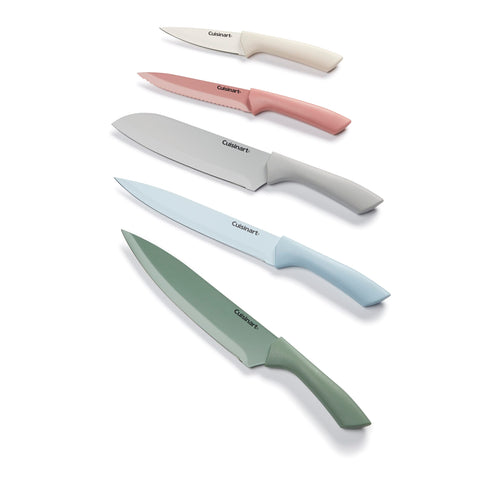 Cuisinart knives laid out on wood board showing each blade type for quick selection