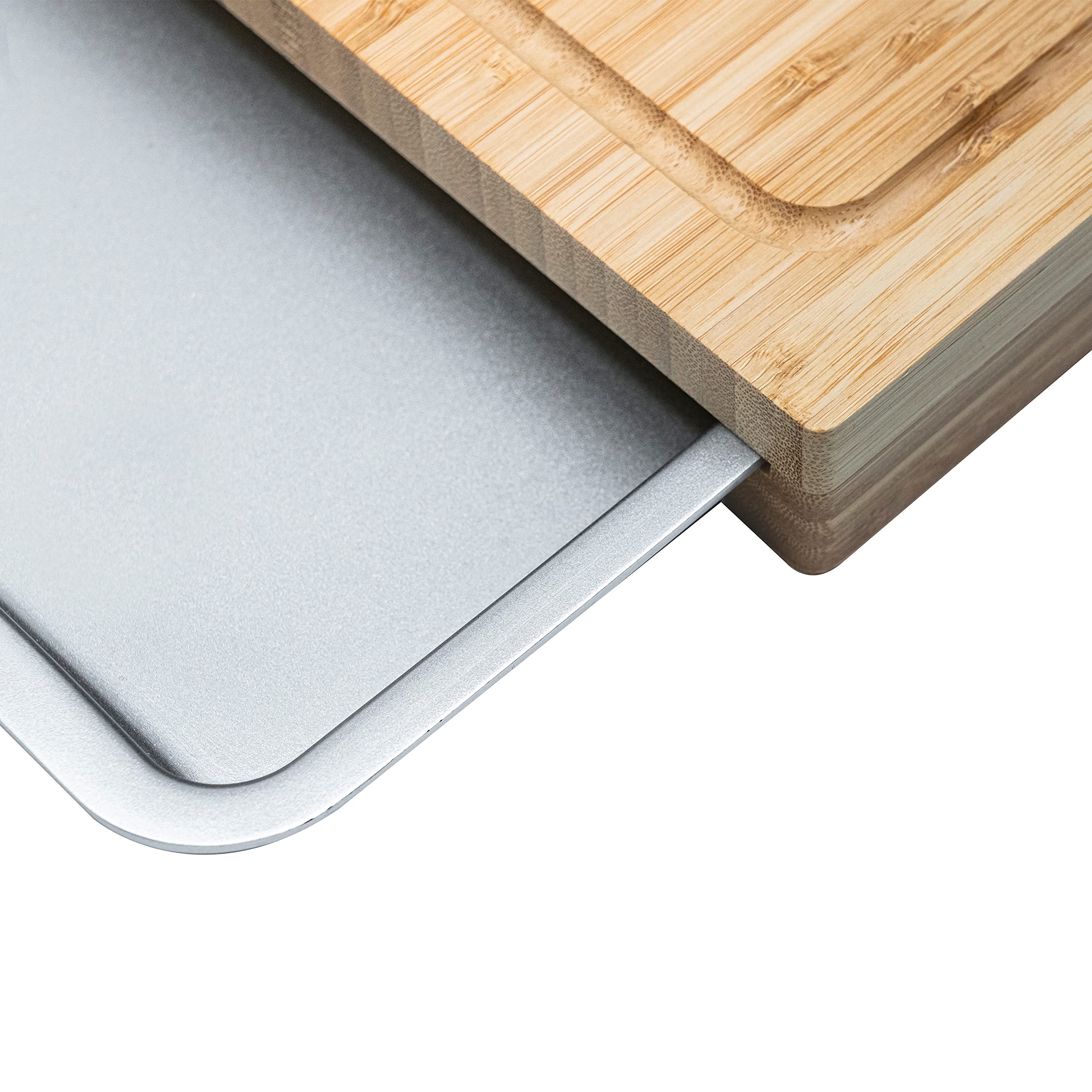 Cuisinart cutting board shown with utensils for size and scale reference