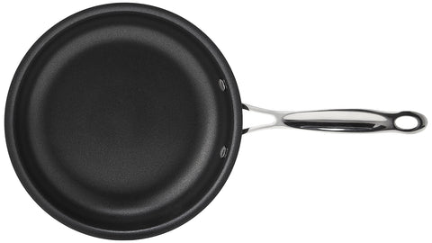 Cuisinart skillet frying an egg demonstrating quick cleanup and nonstick benefit