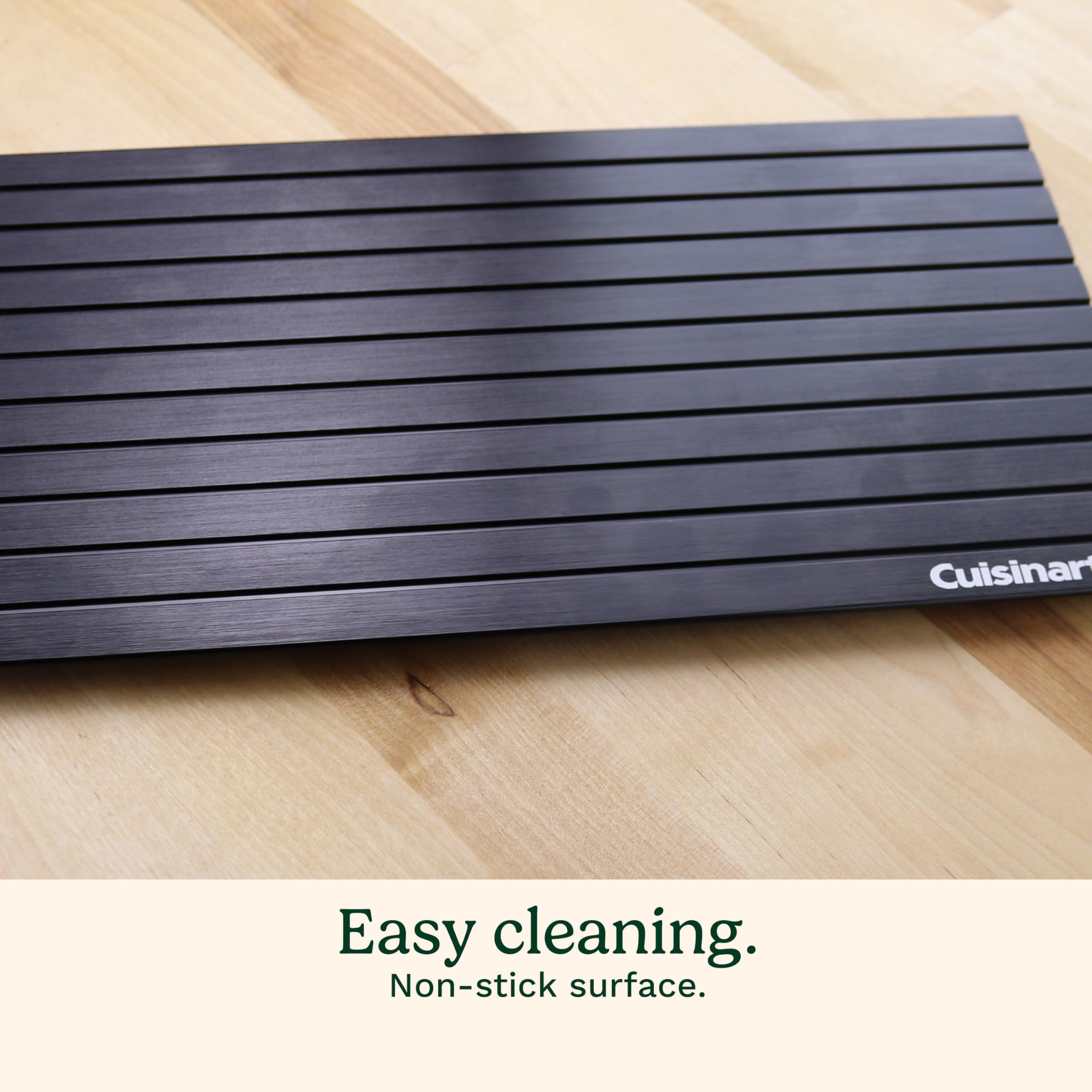 Cuisinart tray held by hand illustrating lightweight design and easy handling benefit