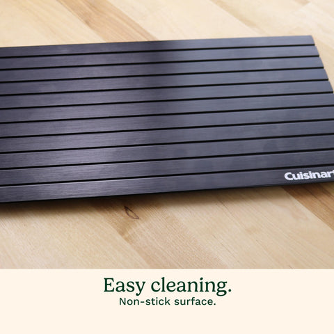Cuisinart tray held by hand illustrating lightweight design and easy handling benefit