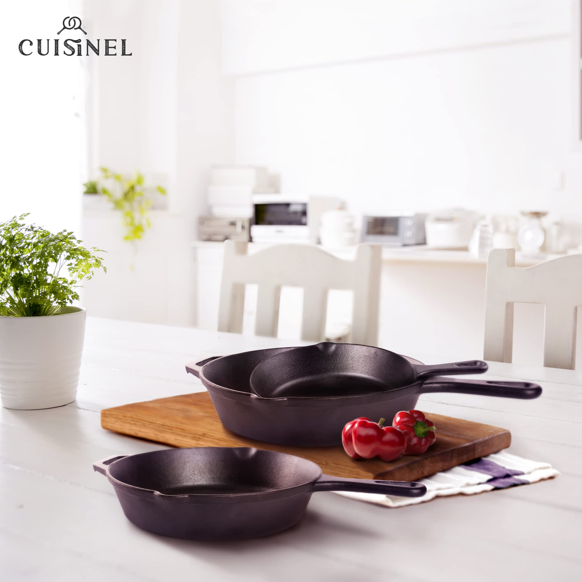 Cuisinel skillet cooking over campfire showing outdoor durability and even heat