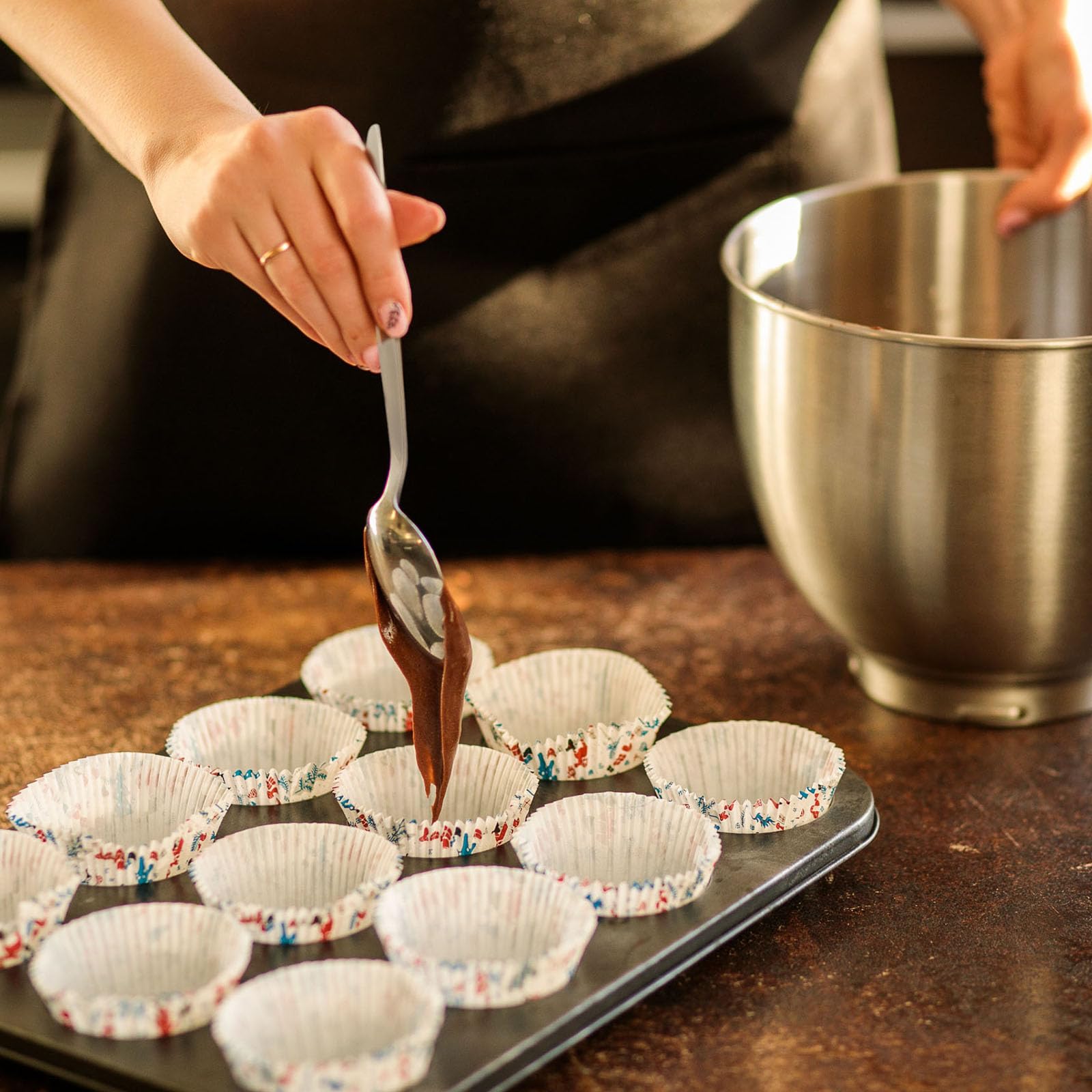 CURISEW spoon beside measuring tablespoon showing 2 Tbsp capacity and portion accuracy
