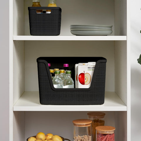 Curver basket in pantry with food items showing tidy organization benefit