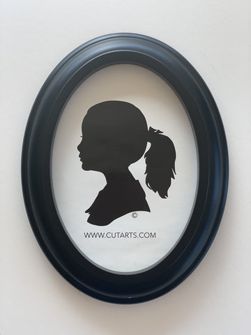 CUT ARTS frame with photo insert demonstrating centered oval composition