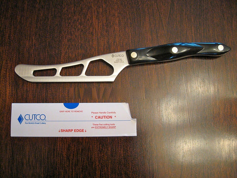 Cutco Model 1764 close-up of perforations and micro-D serration for reduced sticking