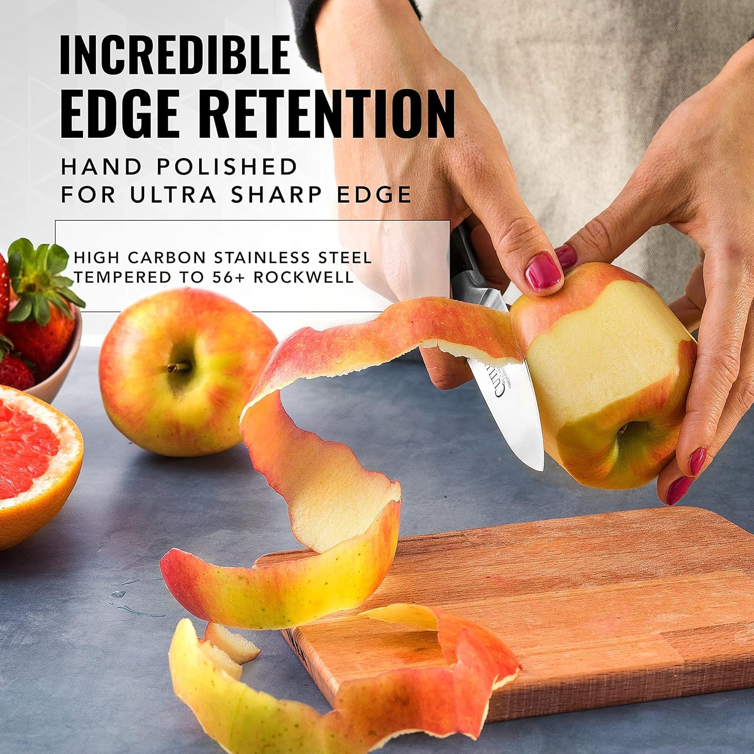Cutluxe santoku slicing vegetables in use for effortless thin cuts