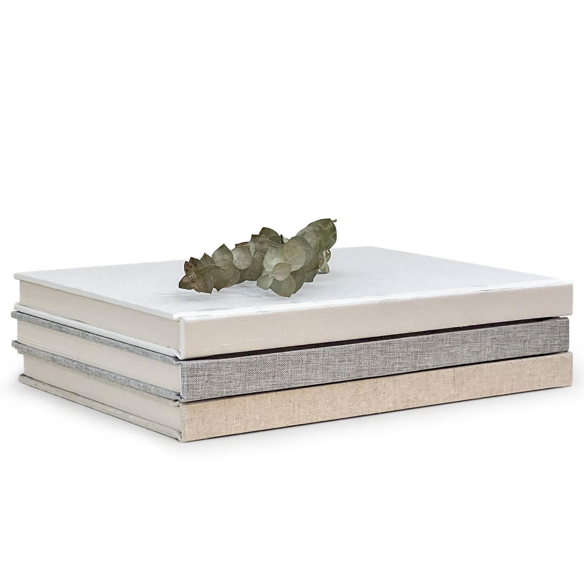 Cypress Gallery front view of three linen books showing neutral colors and elegance