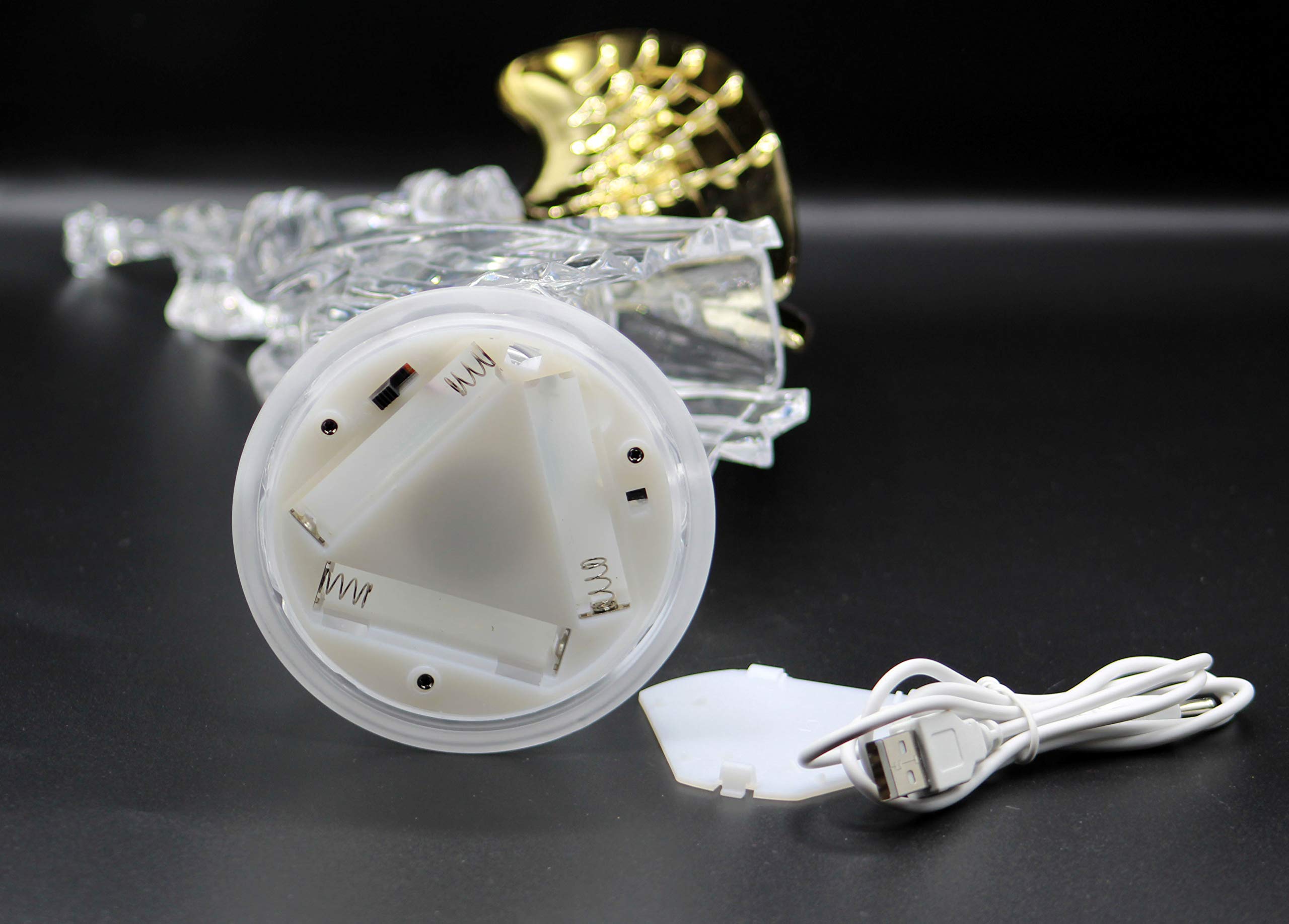 Dalax statue with USB cable connected demonstrating convenient power option