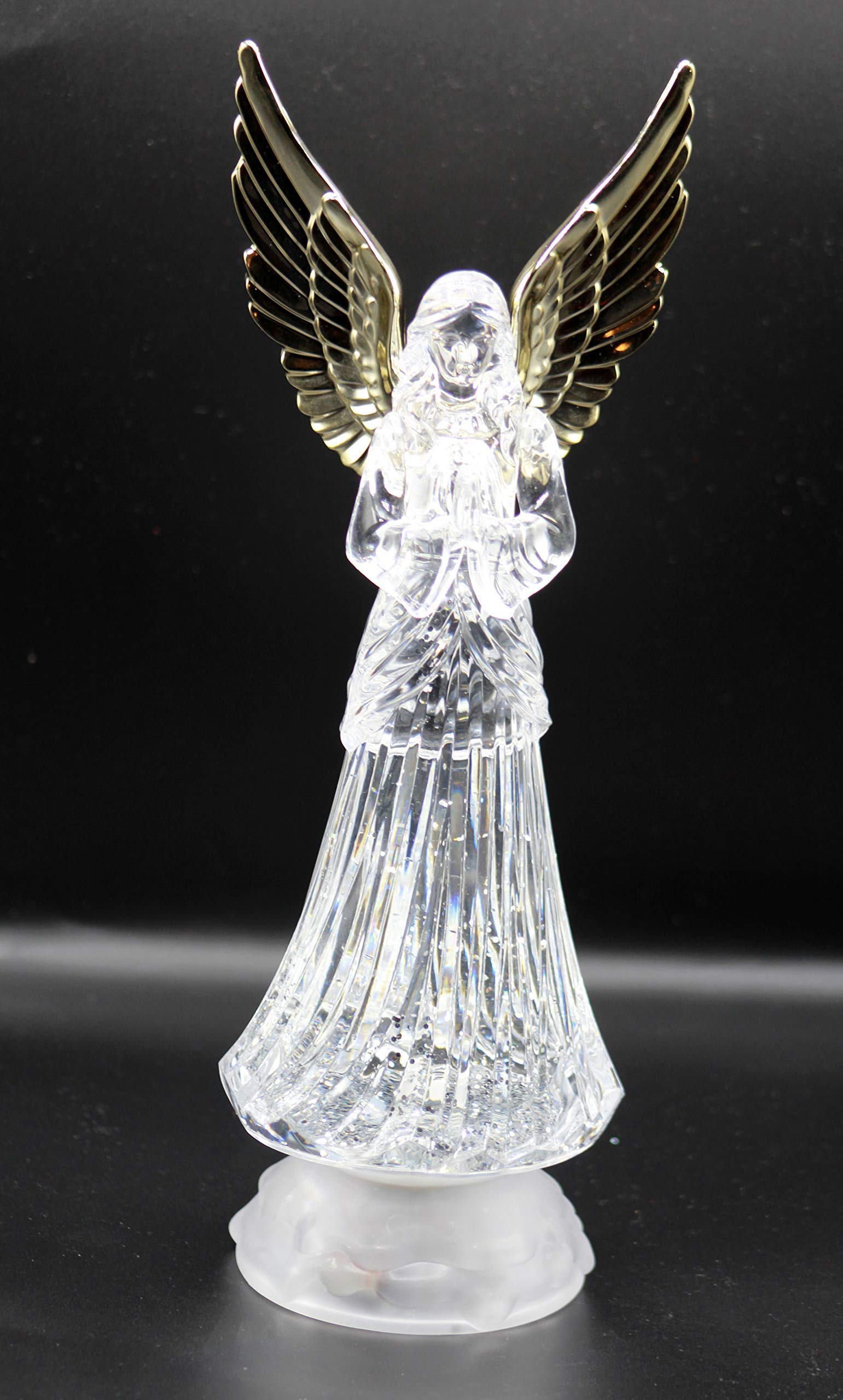 Dalax angel lamp on bedside table in bedroom creating soft nightlight mood and comfort