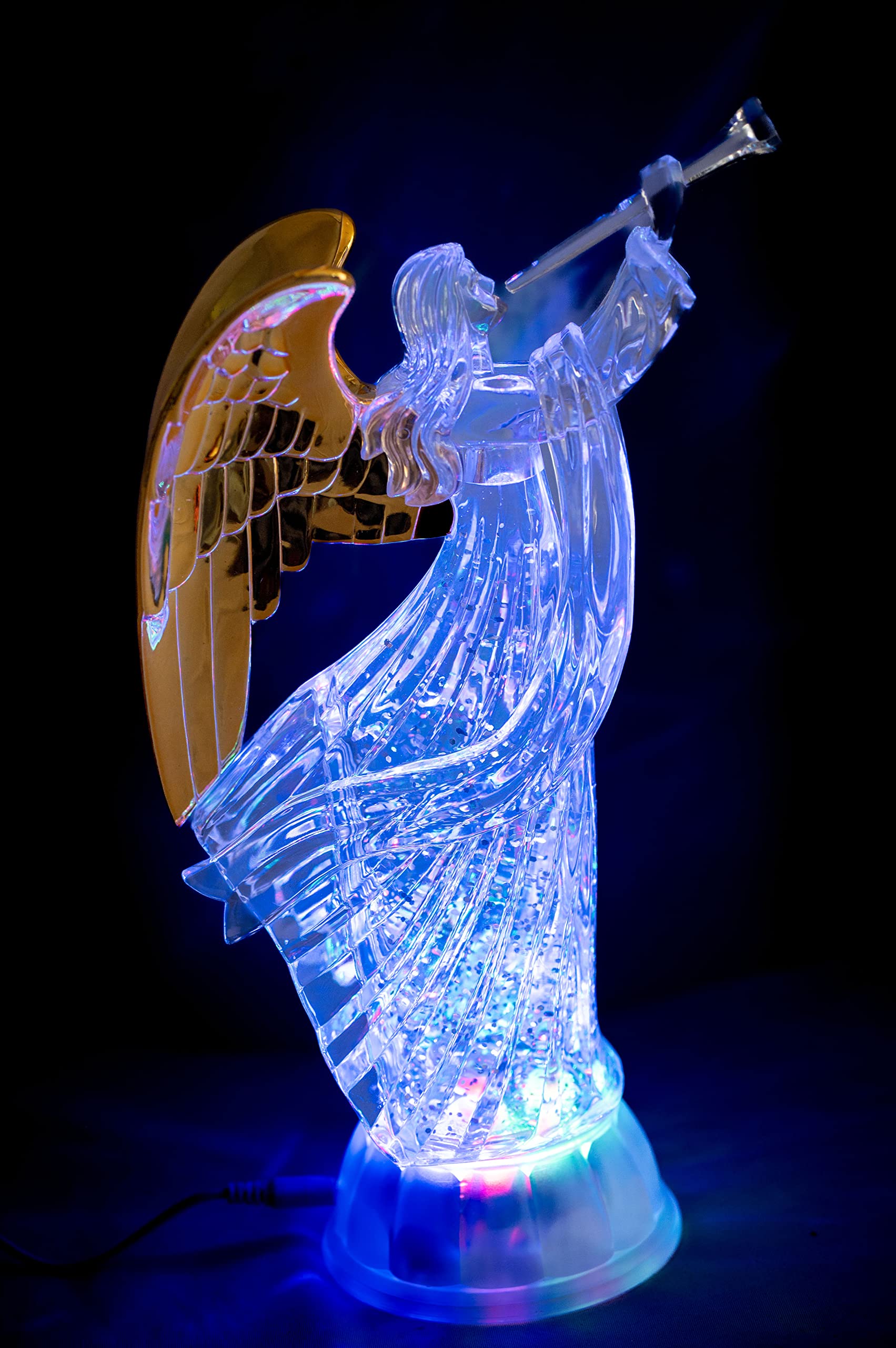 Dalax angel on mantel illustrating holiday or year-round decorative use