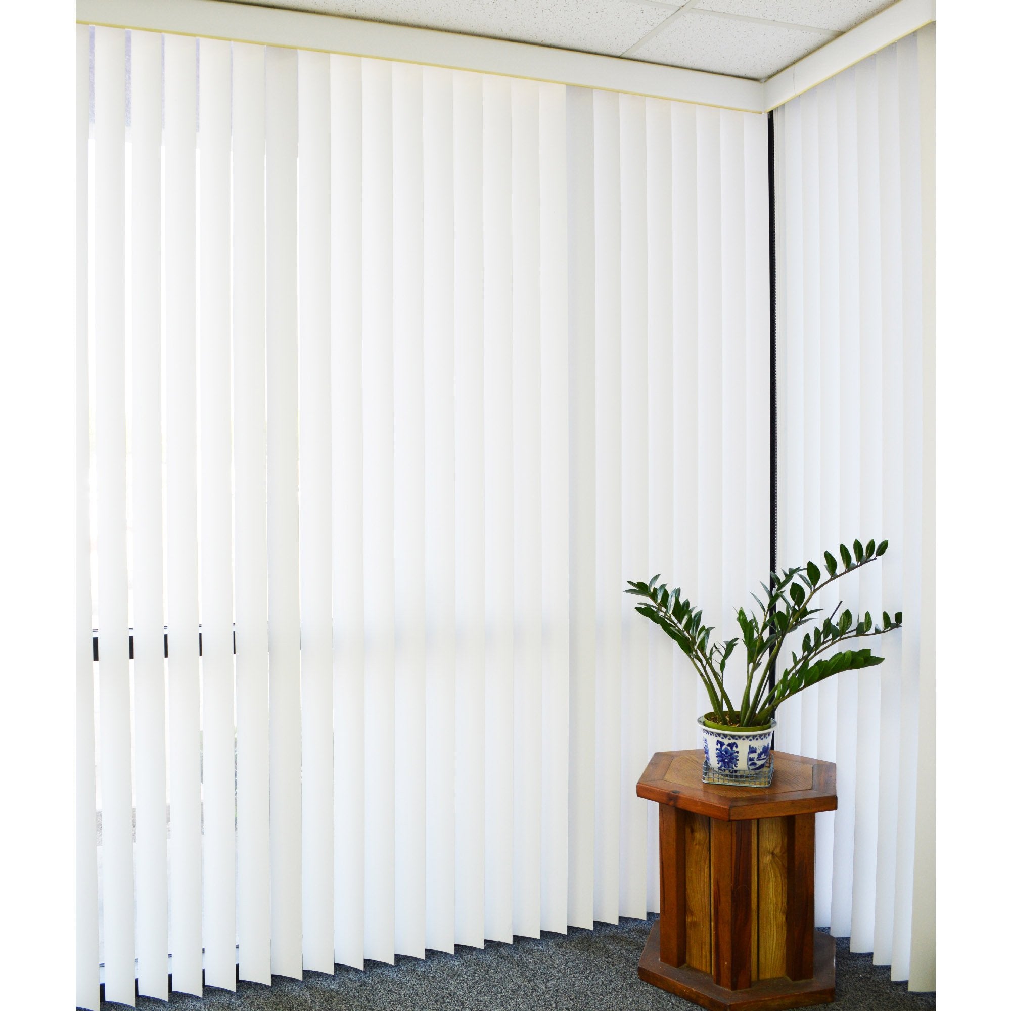DALIX vertical slats on sliding door in living room showing improved light control benefit