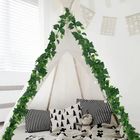 dallisten bedroom wall display draped above bed providing calming greenery without upkeep