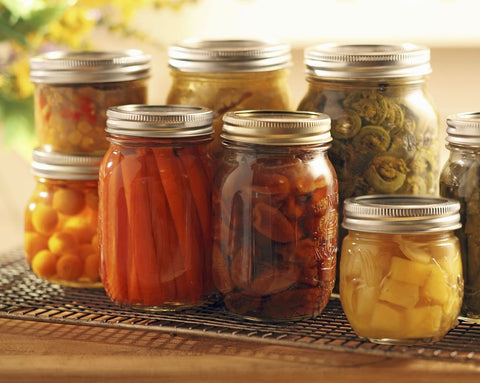 Dalzom lids and rings neatly organized for easy storage and quick access