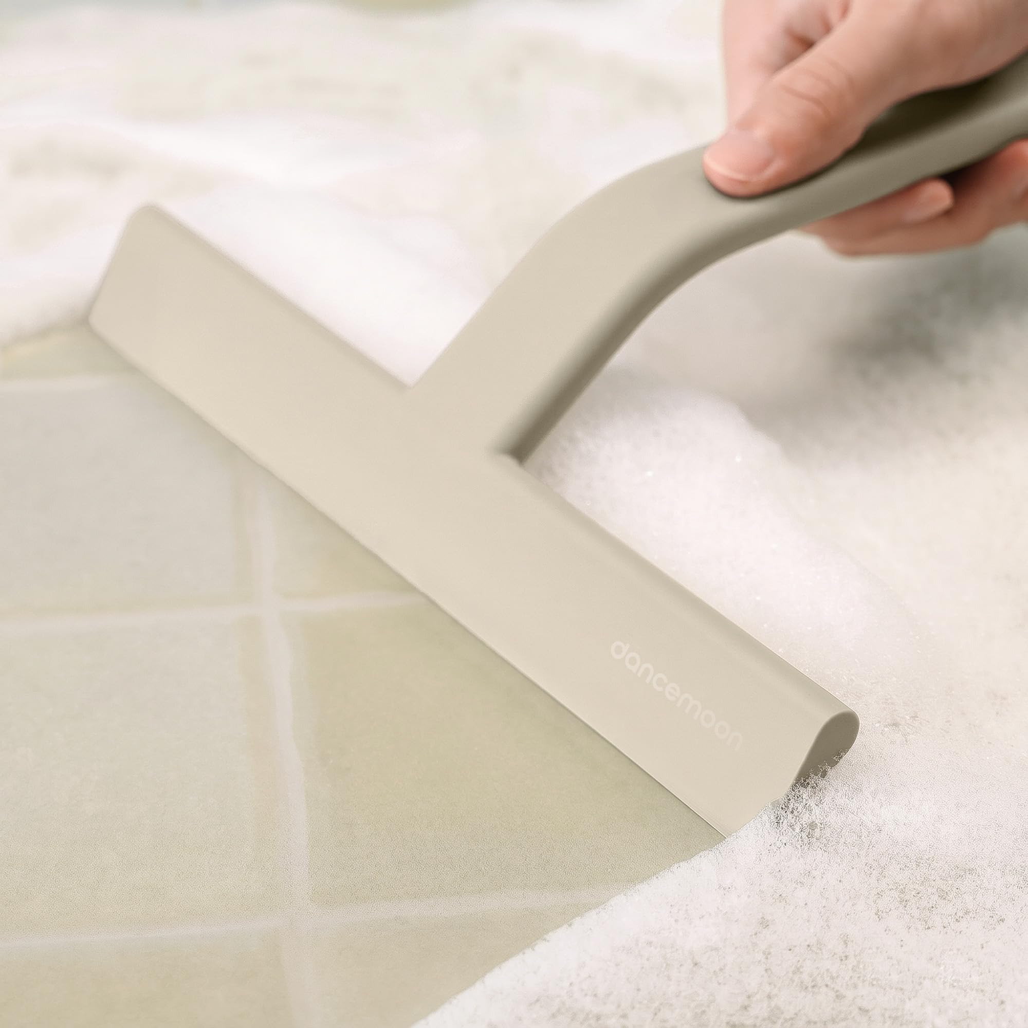 dancemoon in use removing water from glass, fast streak-free cleaning