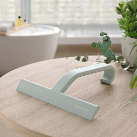 dancemoon squeegee held in hand showing ergonomic grip and balanced weight