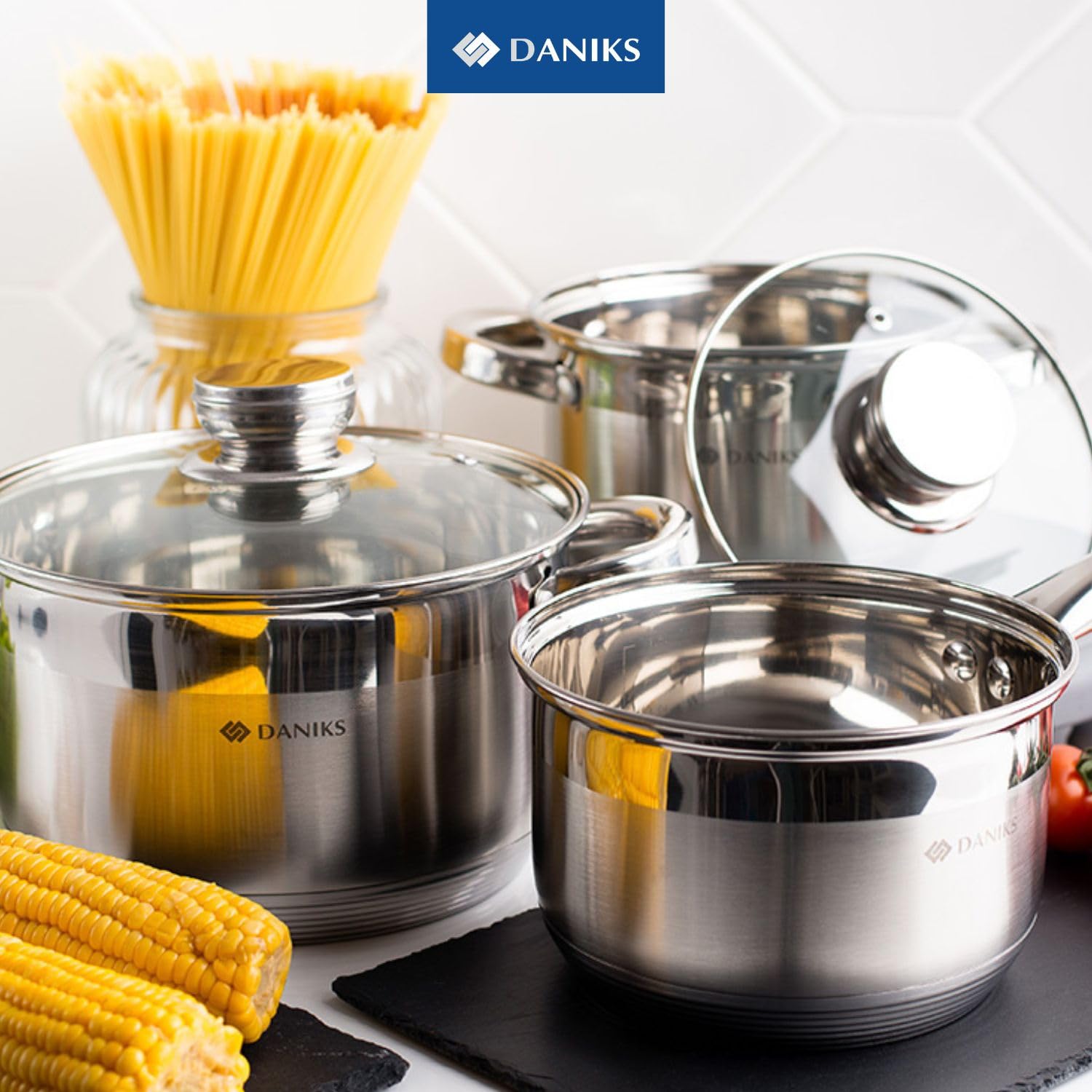 Daniks pot beside common kitchen items for clear size and capacity scale