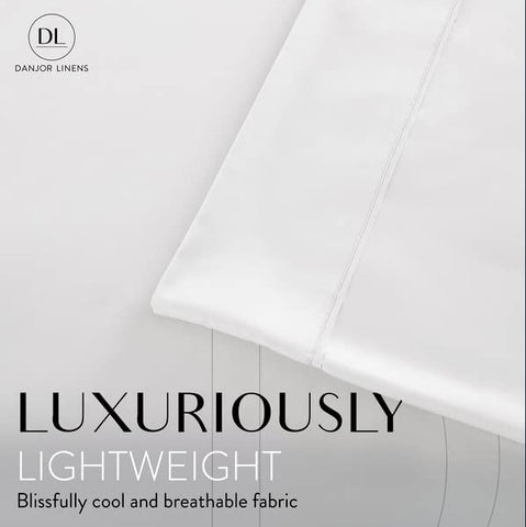 Danjor Linens fitted sheet deep pocket detail securing mattress for snug fit