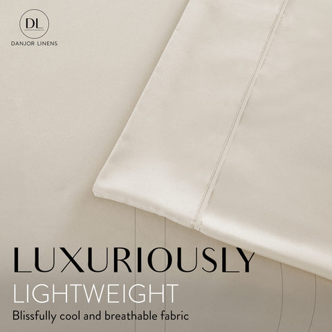 Danjor Linens fitted sheet deep pocket close-up showing secure fit on thick mattresses