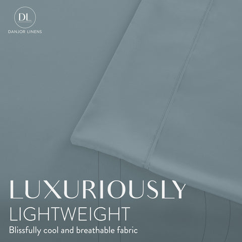 Danjor Linens deep pocket fitted sheet corner detail showing secure fit benefit