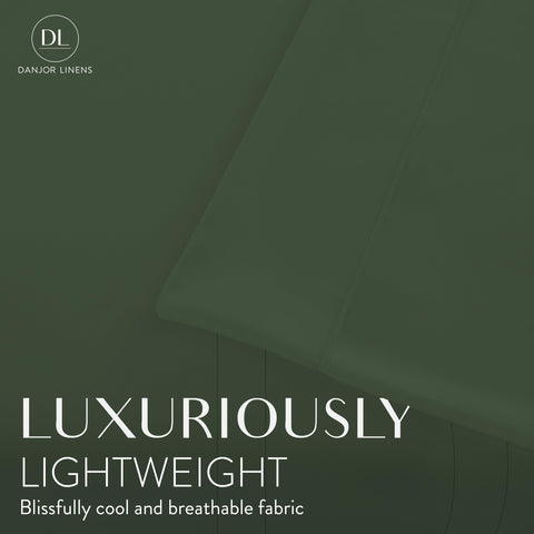 Danjor Linens fitted sheet corner showing deep pocket and snug mattress hold benefit