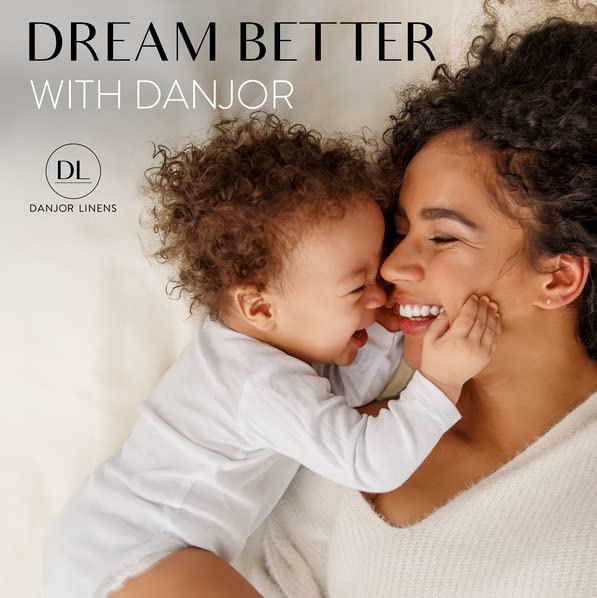 Danjor Linens lifestyle bedroom scene showcasing cream sheets delivering calm aesthetics