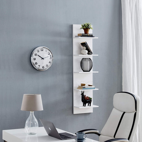 Danya B shelf beside chair for scale showing narrow footprint advantage
