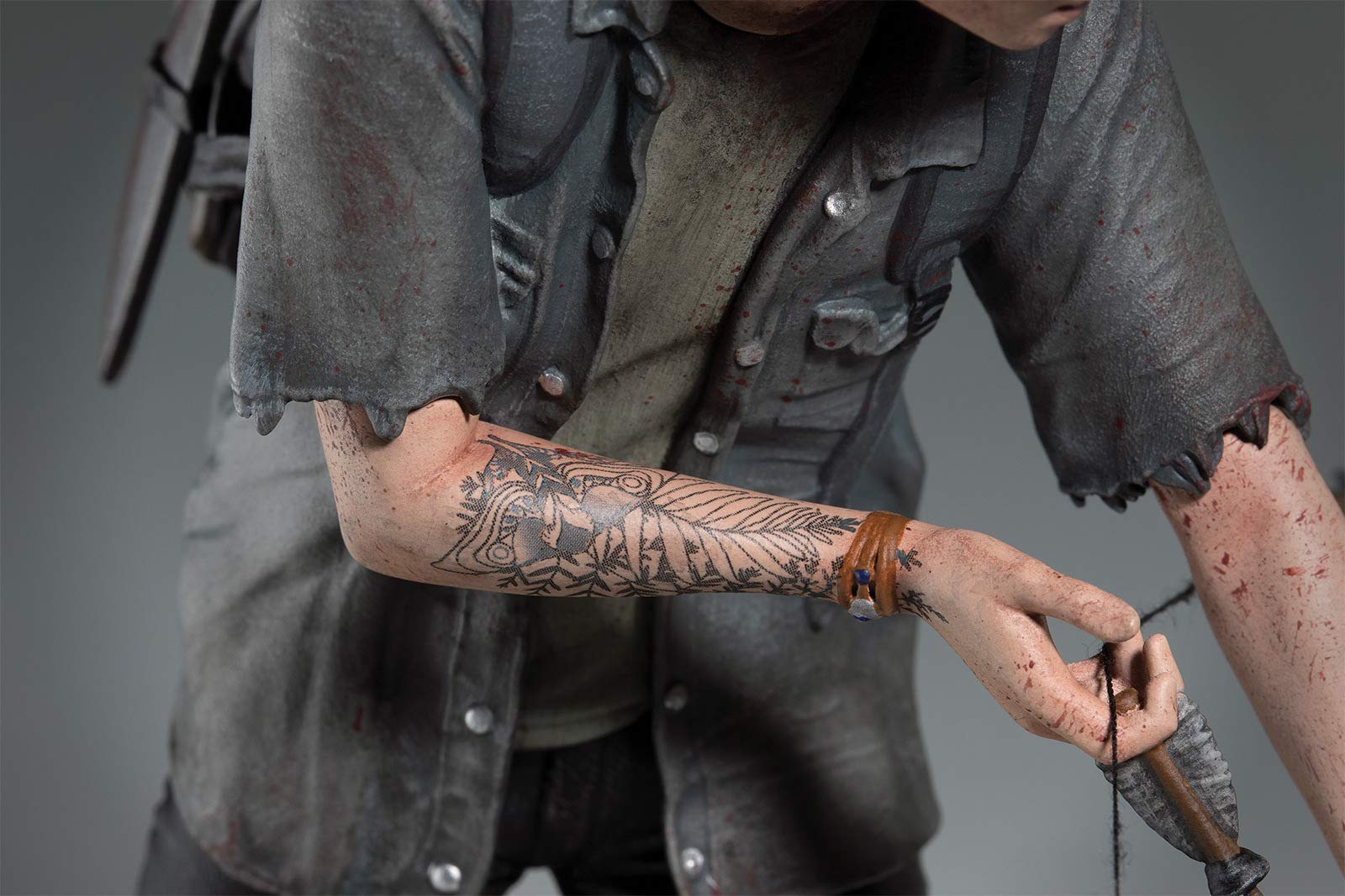 Dark Horse Ellie bow and hands detail showing realistic weapon texture