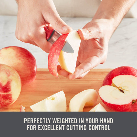 Dash Zakarian in use peeling a tomato demonstrating serrated blade precision benefit