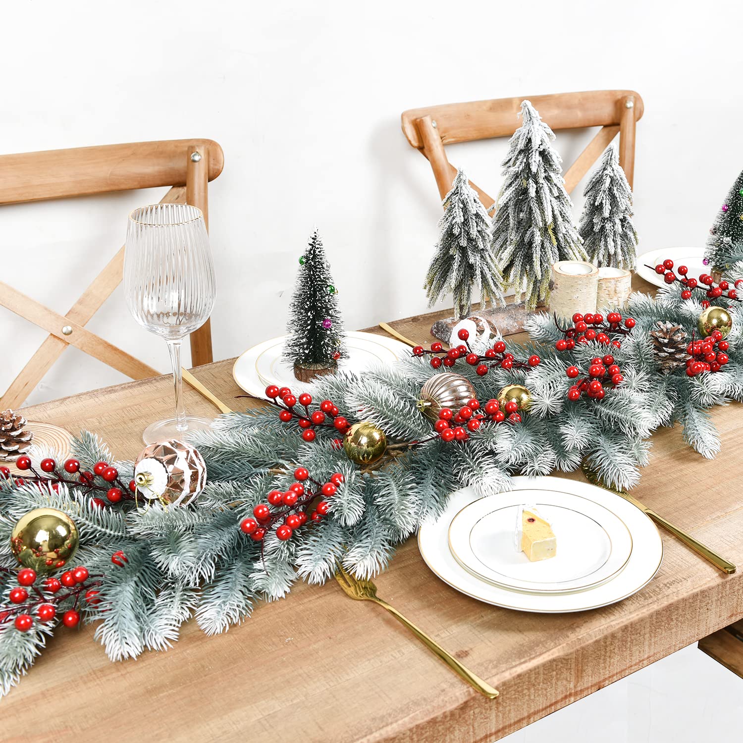 DearHouse garland styled on mantel adding cozy winter focal point