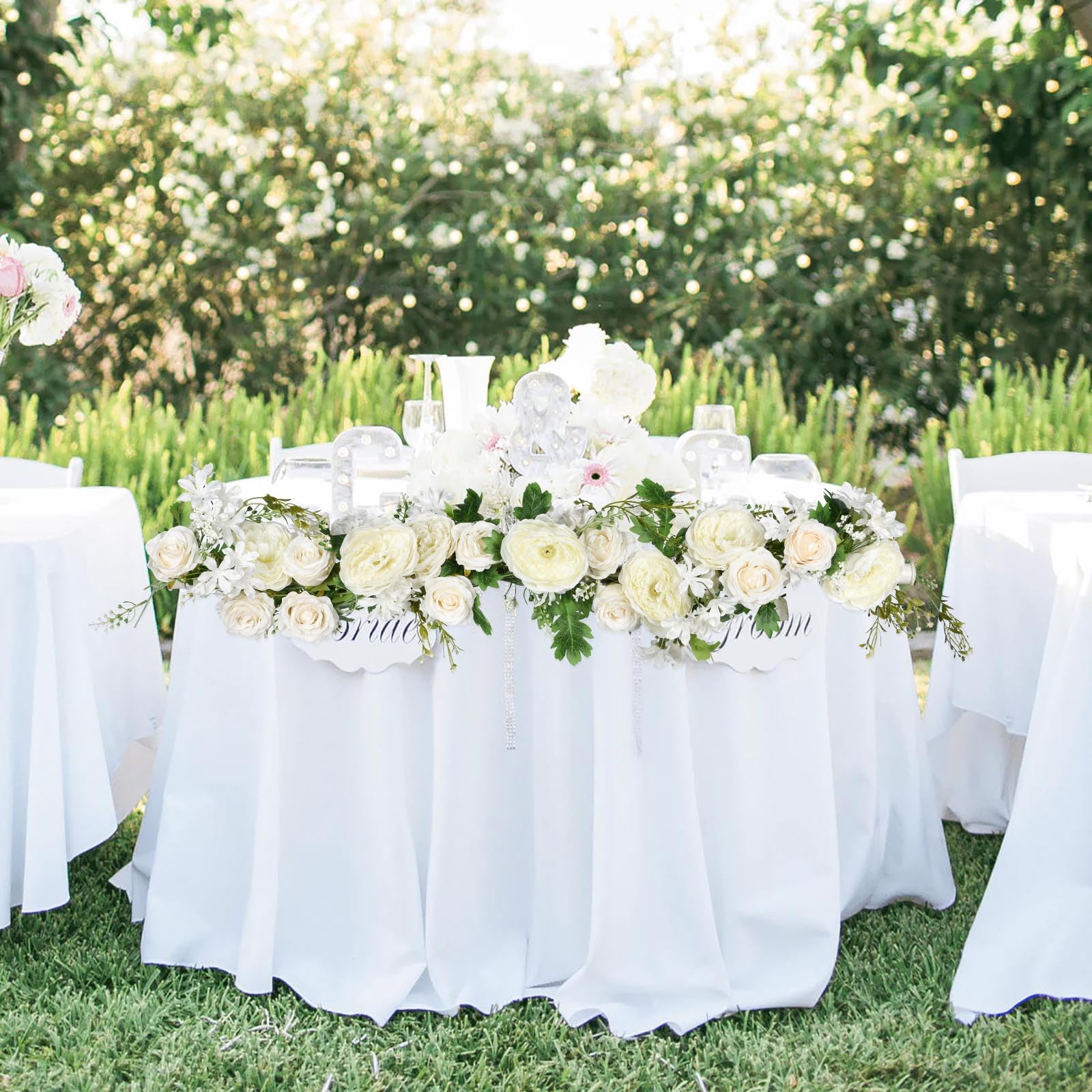 DearHouse garland framing doorway arch establishes instant ceremony backdrop