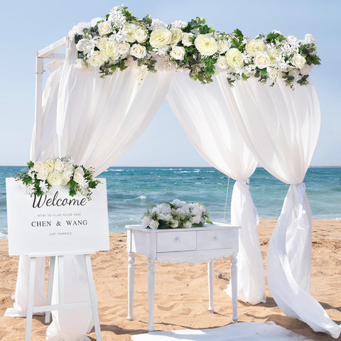 DearHouse garland styled as table centerpiece creates soft wedding ambiance