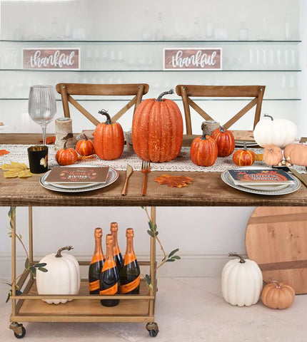 DearHouse pumpkins in a shop window creating inviting harvest visuals