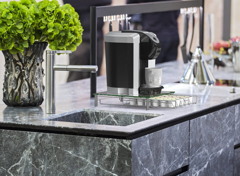Deco Brothers placed under coffee brewer demonstrates space-saving benefit