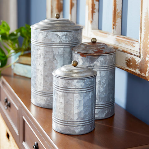 deco 79 jars next to coffee mug for size comparison showing scale benefit